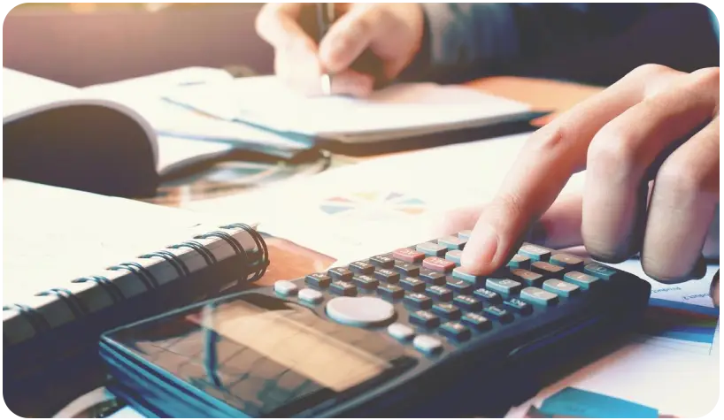 A person is using a calculator to do their work.